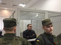 Суд відпустив поліцейського Олійника