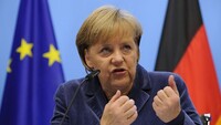Меркель обіцяє не втрачати терпіння в переговорах з Путіним